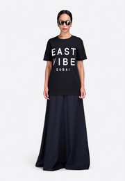 Full front view of EV 3D Embroidered T-Shirt – East Vibe, on plain background, model wearing.